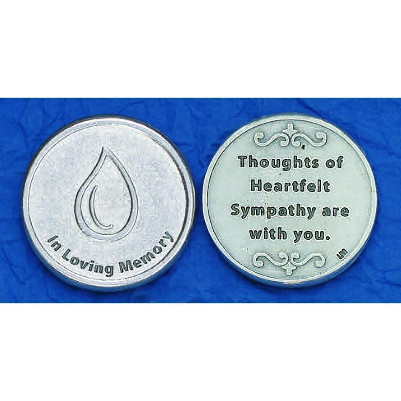 Two round silver sympathy coins displayed side by side on a textured blue background. The left coin features a water droplet design with the text 'In Loving Memory' around it.